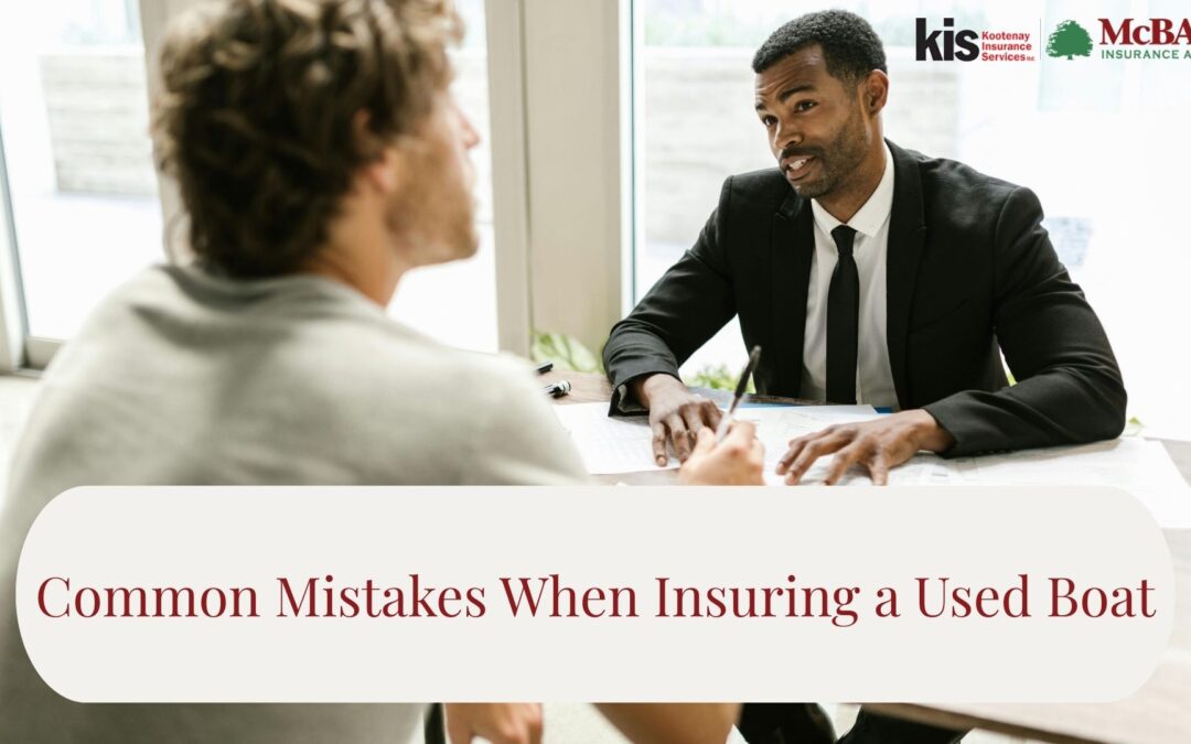 An insurance advisor speaking with a client across a desk, reviewing documents.